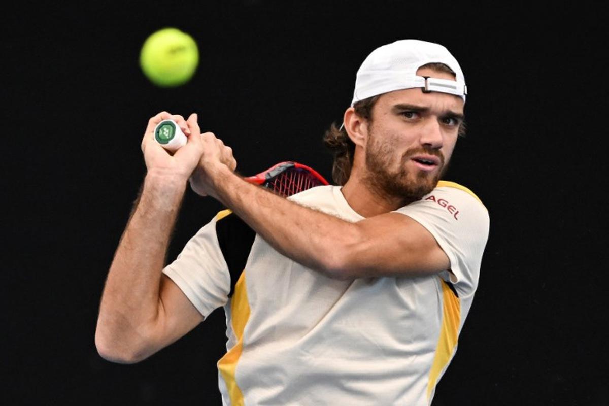 Czech Republic's Tomas Machac hits a shot against France's Ugo Humbert in their men's singles final match at the Adelaide International tennis tournament in Adelaide on January 17, 2026. Michael ERREY / AFP