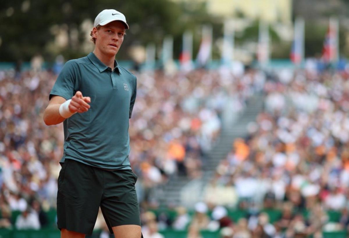 Italy's Jannik Sinner gestures as he plays against France's Ugo Humbert during the Monte Carlo ATP Masters Series Tournament round of 64 tennis match on Court Rainier III at the Monte-Carlo Country Club in Roquebrune-Cap-Martin, south-eastern France on April 7, 2026. Valery HACHE / AFP