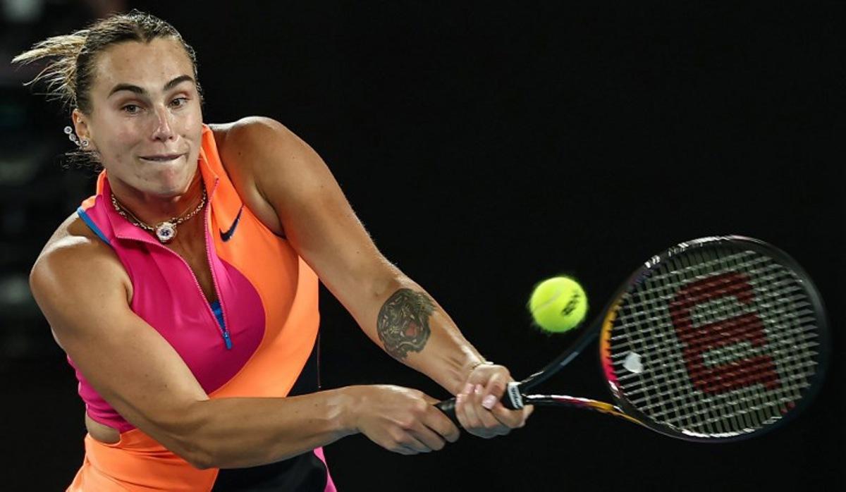 Belarus' Aryna Sabalenka hits a return against Kazakhstan's Elena Rybakina during their women's singles final match on day fourteen of the Australian Open tennis tournament in Melbourne on January 31, 2026. IZHAR KHAN / AFP