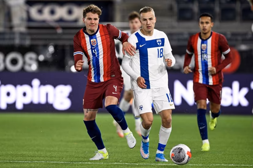 Norway's Leo Fuhr Hjelde and Finland's Topi Keskinen vie for the ball during the U21 European Championship qualifier match in men's football between Norway and Finland at SR-Bank in Stavanger, Norway on November 19, 2024. Carina Johansen / NTB / AFP
