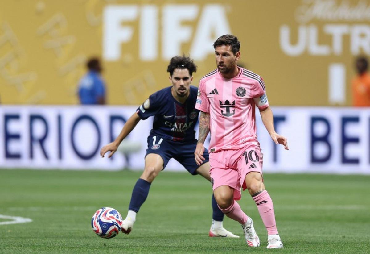 Inter Miami's Argentine forward #10 Lionel Messi and Paris Saint-Germain's Portuguese midfielder #17 Vitinha fight for the ball during the FIFA Club World Cup 2025 round of 16 football match between France's Paris Saint-Germain and US Inter Miami at the Mercedes-Benz Stadium in Atlanta on June 29, 2025. CHARLY TRIBALLEAU / AFP