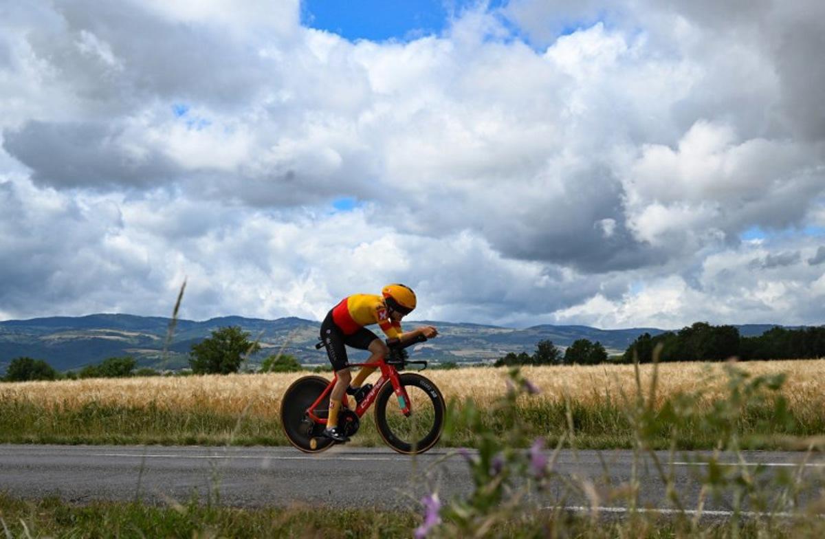 Uno-X Cycling team's Danish rider Anthon Charmig rides during the fourth stage of the 74th edition of the Criterium du Dauphine individual time trial cycling race, 31.9 km between Montbrison and La Batie d'Urfe, central eastern France, on June 8, 2022. Marco BERTORELLO / AFP