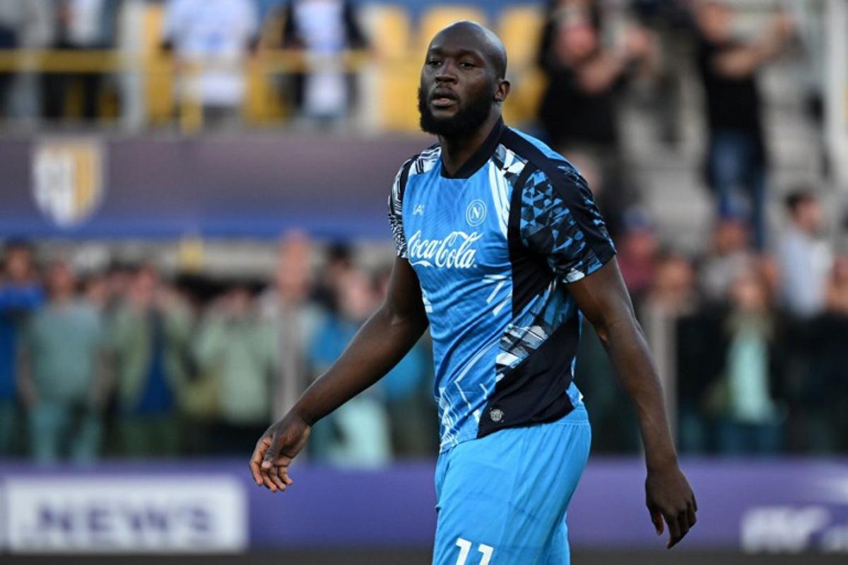 Napoli's Belgian forward #11 Romelu Lukaku warms up before the Italian Serie A football match between Parma and Napoli at the Tardini stadium in Parma on May 18, 2025. Piero CRUCIATTI / AFP