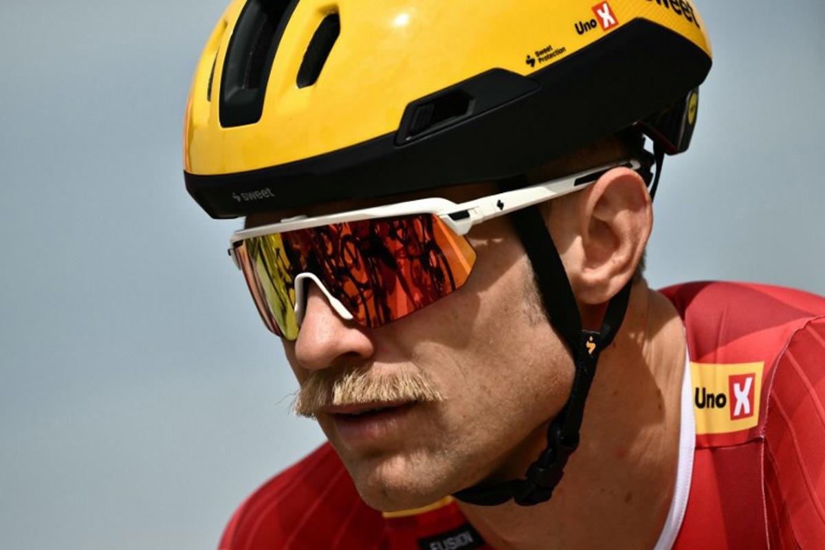 Uno-X Mobility team's Danish rider Magnus Cort Nielsen awaits the start of the 1st stage of the 112th edition of the Tour de France cycling race, 184.9 km starting and finishing in Lille Metropole, northern France, on July 5, 2025. Marco BERTORELLO / AFP