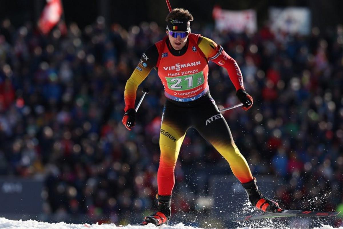 Belgium's Florent Claude competes in the Single Mixed Relay event of the IBU Biathlon World Championship of Lenzerheide, eastern Switzerland, on February 20, 2025. FRANCK FIFE / AFP