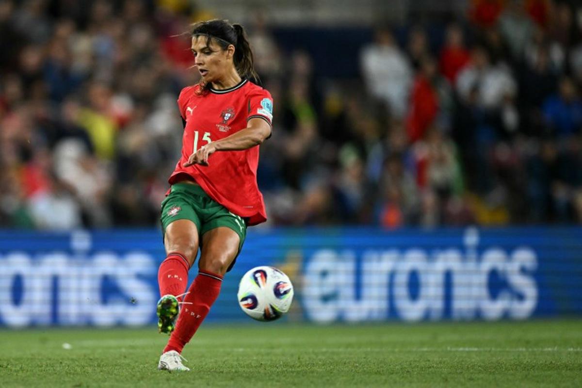 Portugal's defender #15 Carole Costa controls the ball during the UEFA Women's Euro 2025 Group B football match between Portugal and Italy at the Stade de Geneve in Geneva, on July 7, 2025. Fabrice COFFRINI / AFP