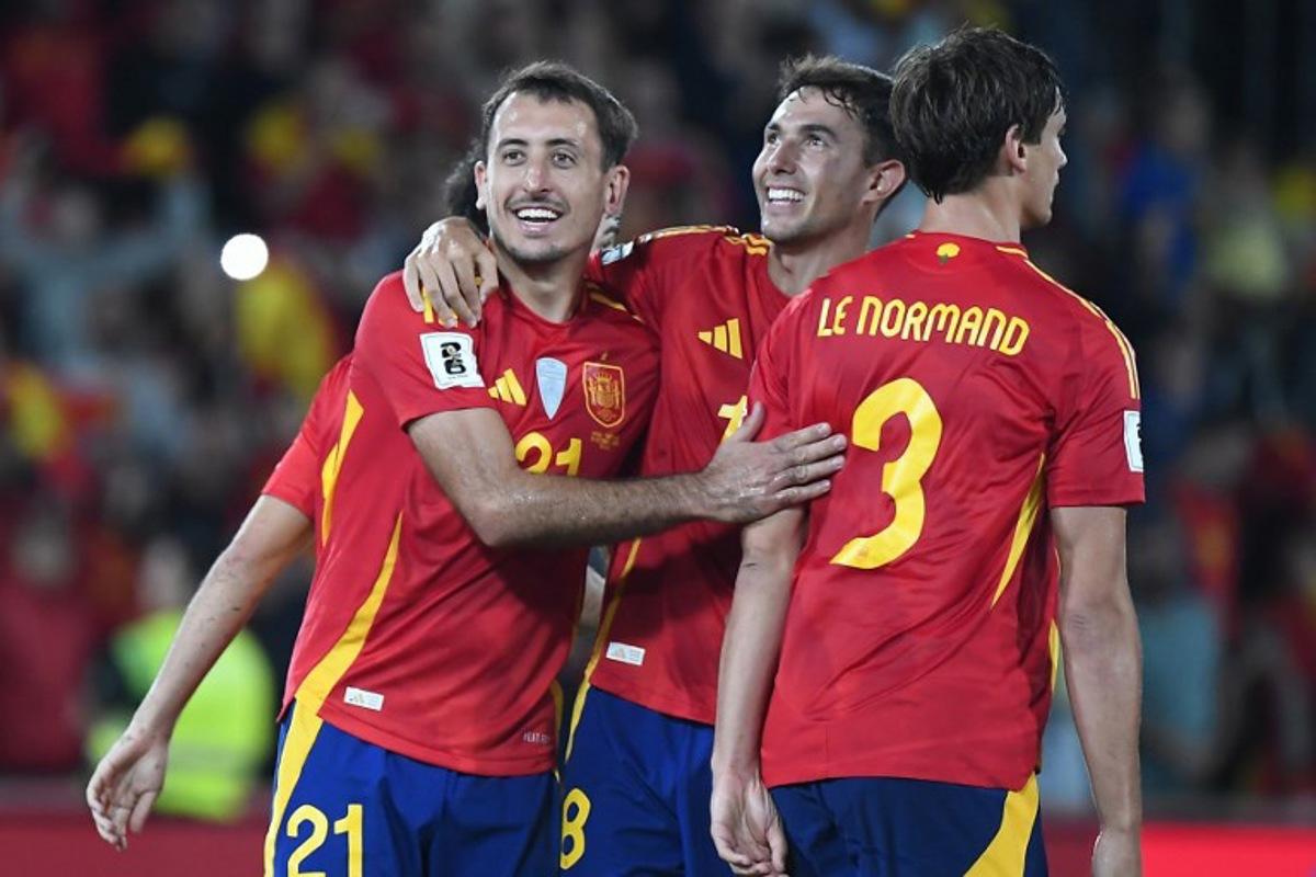Spain's forward #21 Mikel Oyarzabal celebrates scoring his team's second goal during the 2026 World Cup qualifier Europe zone group E football match between Spain and Georgia at Manuel Martinez Valero stadium in Elche on October 11, 2025. Jose Jordan / AFP