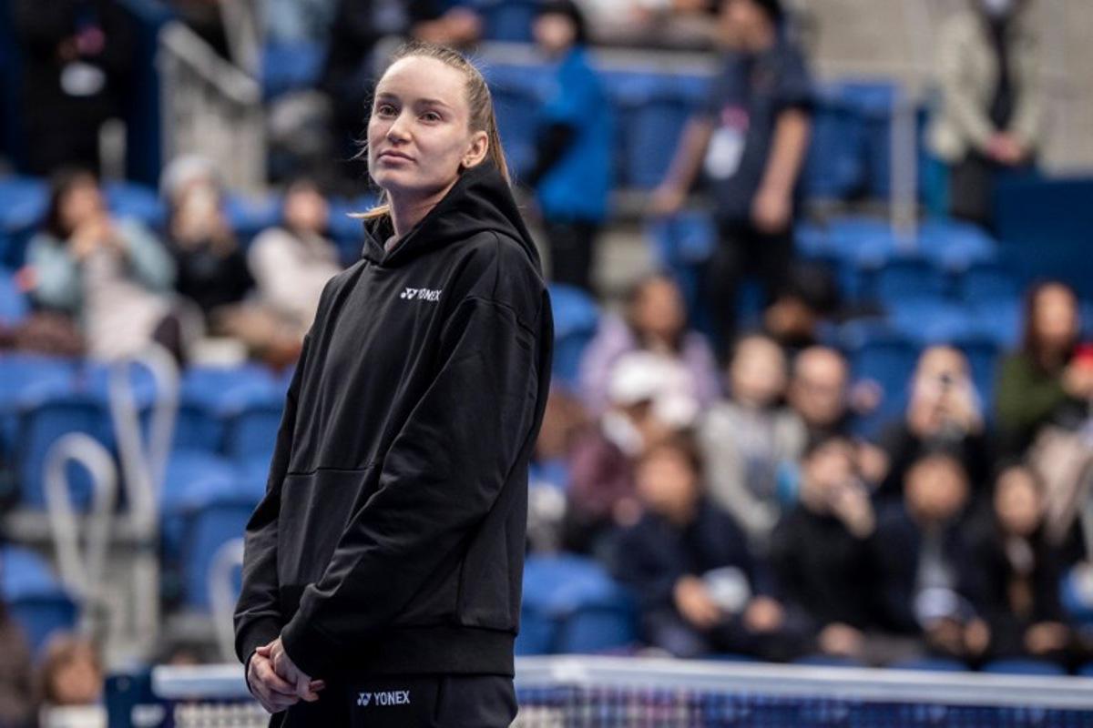 Kazakhstan's Elena Rybakina looks on as she speaks after retiring due to an injury from her quarter-final match against Canada's Leylah Fernandez during the WTA Pan Pacific Open tennis tournament at Ariake Coliseum in Tokyo on October 30, 2026. Elena Rybakina withdrew with a neck injury, a day after she secured the year-end world number one ranking. Yuichi YAMAZAKI / AFP