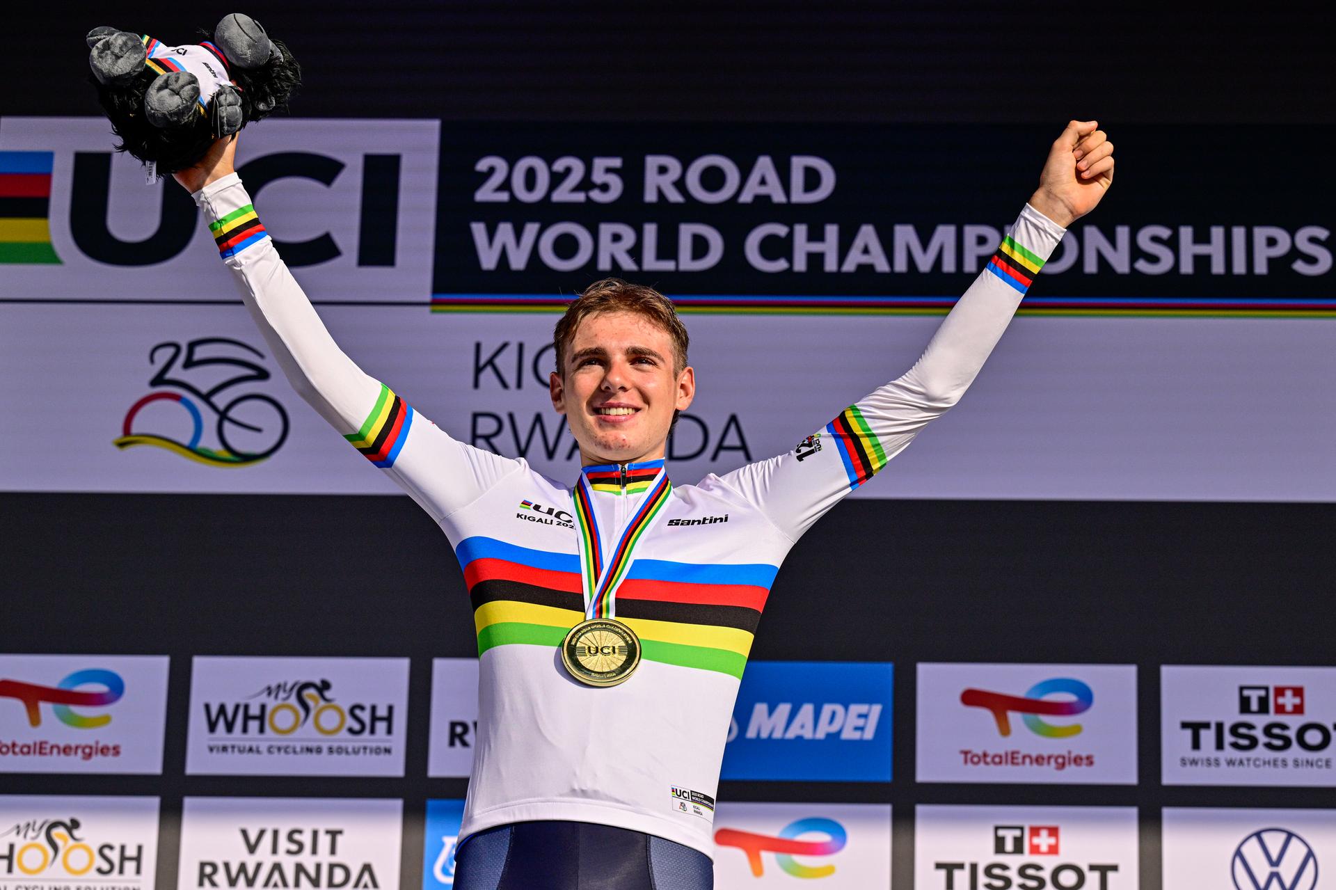 Italian Lorenzo Finn celebrates on the podium after winning the u23 men road race (164,6 km) at the cycling road World Championships in Kigali, Rwanda, Friday 26 September 2025. The 2025 UCI Road World Championships take place from 21 to 28 September in Kigali, Rwanda. BELGA PHOTO DIRK WAEM