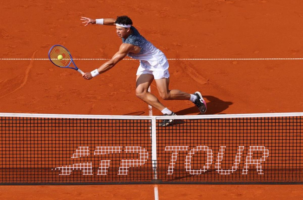 US Ben Shelton returns to Slovakia's Alex Molcan during their men's singles semi-final match at the ATP Munich Open tennis tournament in Munich, southern Germany on April 18, 2026. Alexandra BEIER / AFP