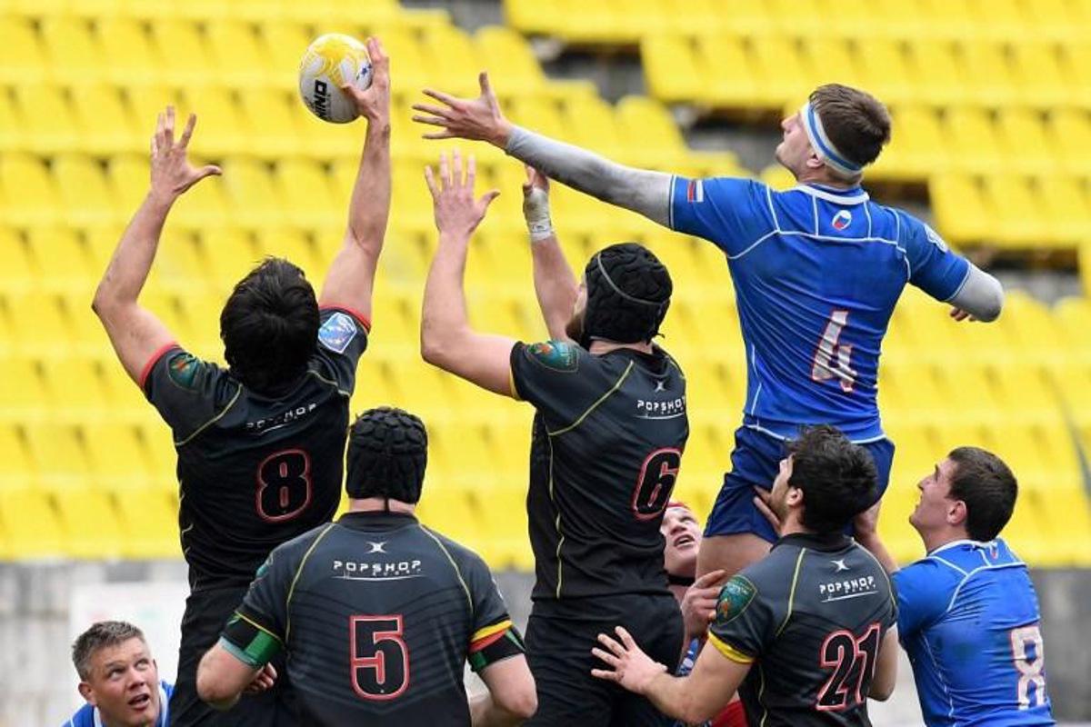 Russia's lock Bogdan Fedotko (R) vies Belgium's number 8 Bertrand Billi (L) and back row Gillian Benoy during the Rugby union Europe Championship match between Russia and Belgium in Sochi on February 16, 2019. Kirill KUDRYAVTSEV / AFP