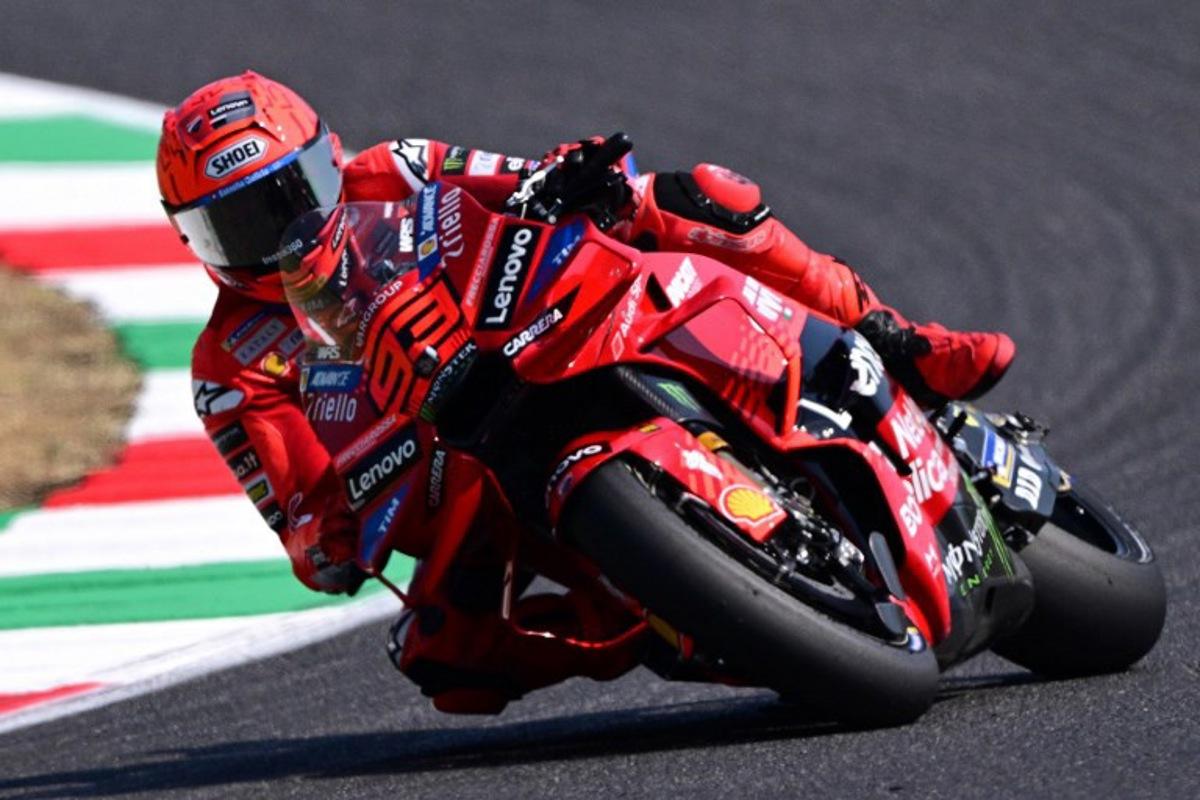 Ducati Lenovoi Team's Spanish MotoGP rider Marc Marquez steers his motorbike during the free practice sessions on the eve of the Italian Moto GP Grand Prix at Mugello circuit, in Mugello, near Florence, on June 21, 2025. Tiziana FABI / AFP