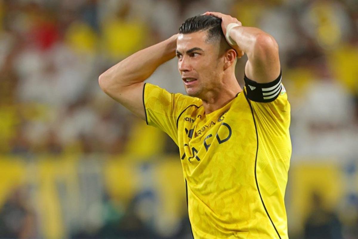 Nassr's Portuguese forward #07 Cristiano Ronaldo reacts after missing a goal during the Saudi Pro League football match between Al-Nassr and Al-Hilal at King Fahd Sports City Stadium in Riyadh on May 12, 2026. Fayez NURELDINE / AFP