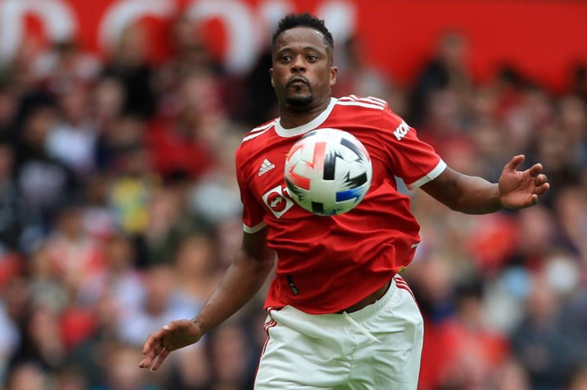 Manchester United's Patrice Evra controls the ball during the Legends of the North football match between Manchester United Legends and Liverpool Legends at Old Trafford in Manchester, north-west England on May 21, 2022. Lindsey Parnaby / AFP