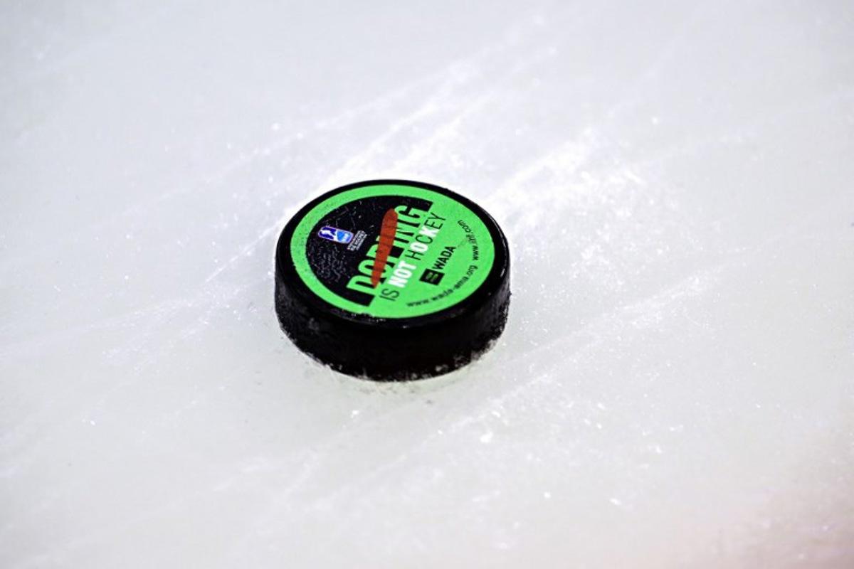 The puck is pictured during the IIHF Men's Ice Hockey World Championship final match between Switzerland and USA in Stockholm, on May 25, 2025. Magnus LEJHALL / TT NEWS AGENCY / AFP
