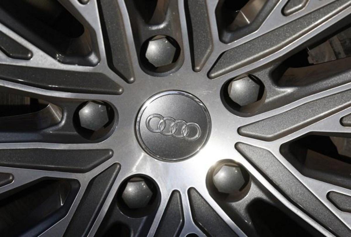 The logo of German carmaker Audi is seen on the wheel rim of a car, on January 21, 2021 in Berlin. Odd ANDERSEN / AFP