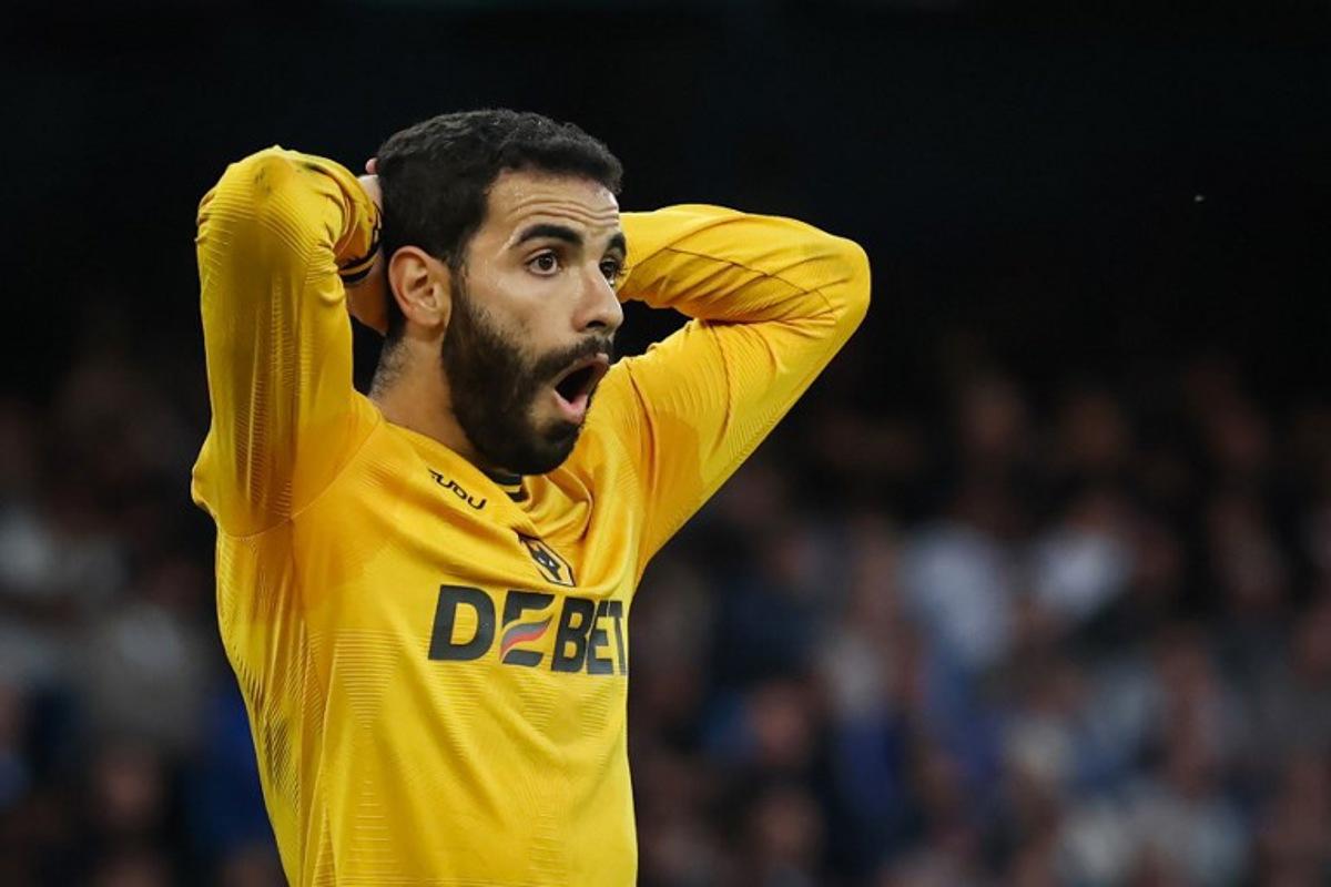 Wolverhampton Wanderers' French defender #03 Rayan Ait-Nouri reacts after a missed chance during the English Premier League football match between Manchester City and Wolverhampton Wanderers at the Etihad Stadium in Manchester, north west England, on May 2, 2025. Darren Staples / AFP
