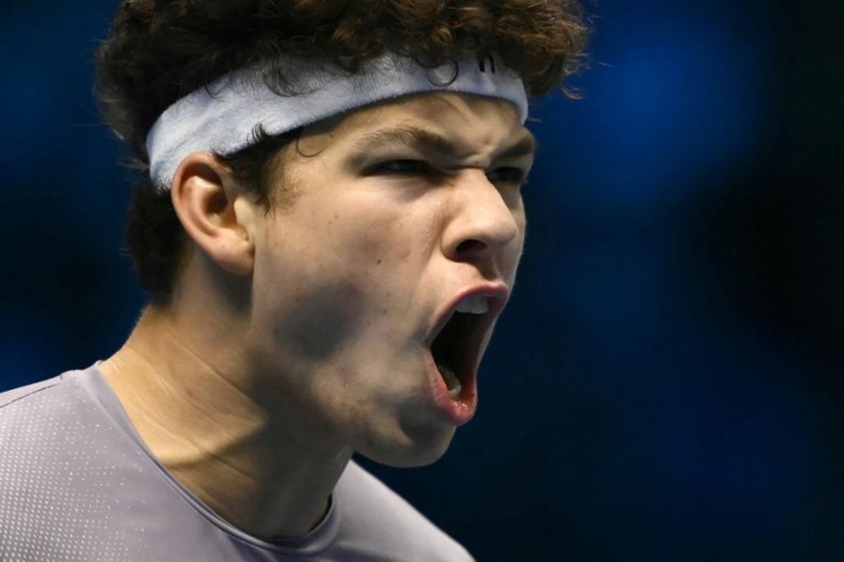 USA's Ben Shelton reacts during his match against Canada's Felix Auger-Aliassime at the ATP Finals tennis tournament in Turin on November 12, 2025. Marco BERTORELLO / AFP
