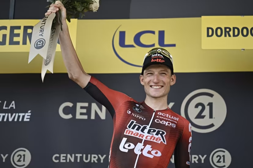 Lotto Intermarché team's Belgian rider Liam Slock celebrates on the podium with the most combative rider's award after the 8th stage of the 113th edition of the Tour de France cycling race, 182 km between Périgueux and Bergerac in southwestern France, on July 11, 2026. Loic VENANCE / AFP