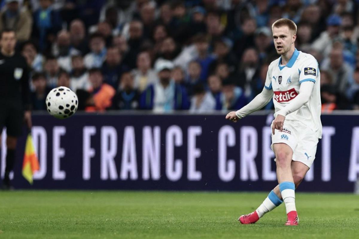 Marseille's Belgian midfielder #18 Arthur Vermeeren kicks the ball during the French Cup quarter final football match between Olympique de Marseille (OM) and Toulouse FC at the Stade Velodrome stadium in Marseille, southern France on March 4, 2026. Thibaud MORITZ / AFP