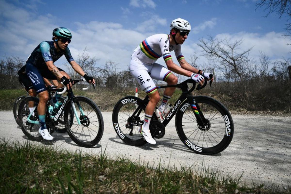 UAE Team Emirates's Slovenian Tadej Pogacar rides during the 20th one-day classic 'Strade Bianche' (White Roads) men's cycling race between Siena and Siena in Tuscany on March 7, 2026. Marco BERTORELLO / AFP