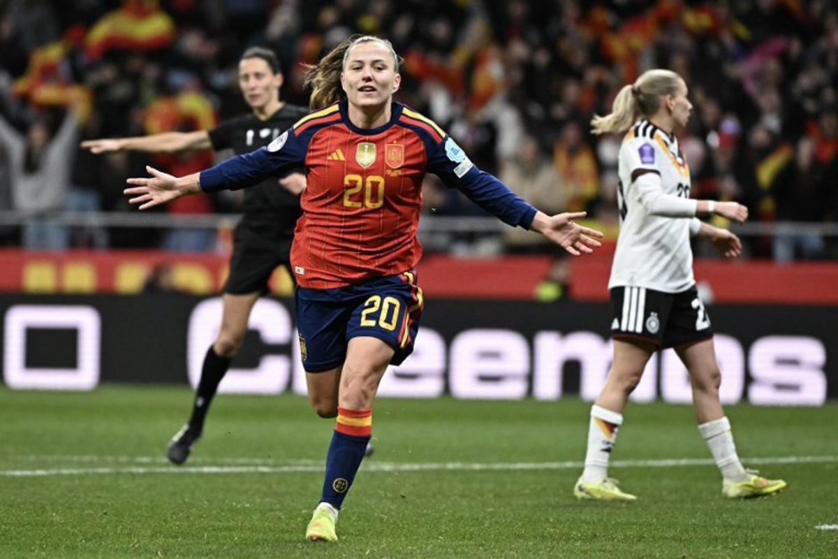 Spain's forward #20 Claudia Pina celebrates after scoring their third goal during the UEFA Women's Nations League second leg final football match between Spain and Germany at the Metropolitano Stadium in Madrid on December 2, 2025. Javier SORIANO / AFP