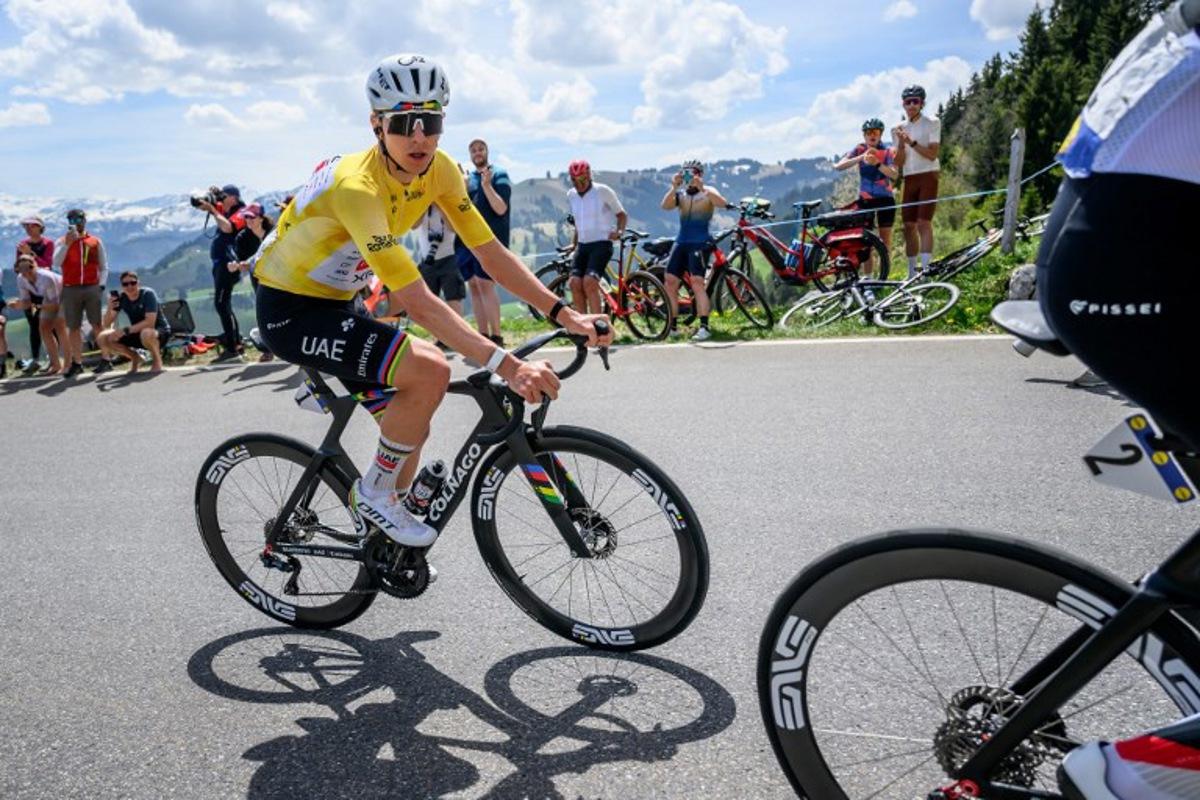 UAE Team Emirates-XRG's Slovenian rider Tadej Pogacar climbs the Jaunpass during the fourth stage of the Tour of Romandie UCI cycling World tour, 149.6 km from Broc and to Charmey, in Jaunpass, Switzerland, on May, 2, 2026. Fabrice COFFRINI / AFP