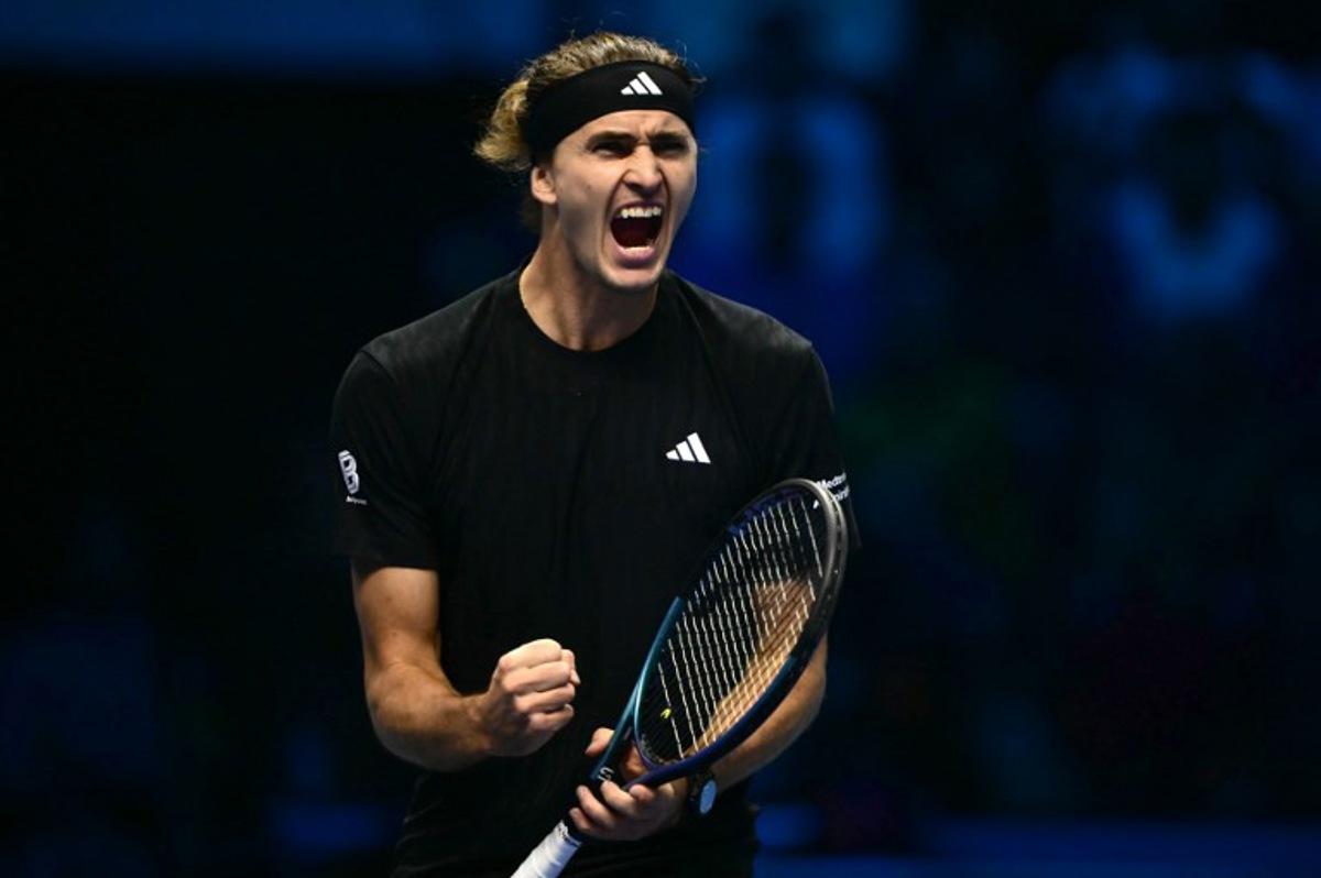 Germany's Alexander Zverev reacts during his match against USA's Ben Shelton at the ATP Finals tennis tournament in Turin on November 9, 2025. Marco BERTORELLO / AFP