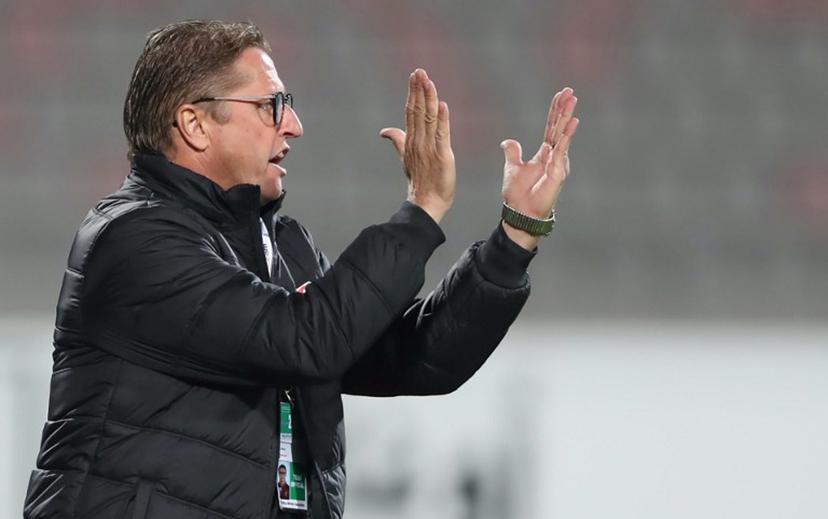 Jordan's coach Vital Borkelmans speaks to his players during the FIFA World Cup 2022 and the 2023 AFC Asian Cup qualifying football match between Jordan and Chinese Taipei Amman International Stadium in the Jordanian capital on November 19, 2019. Ahmad ALAMEEN / AFP