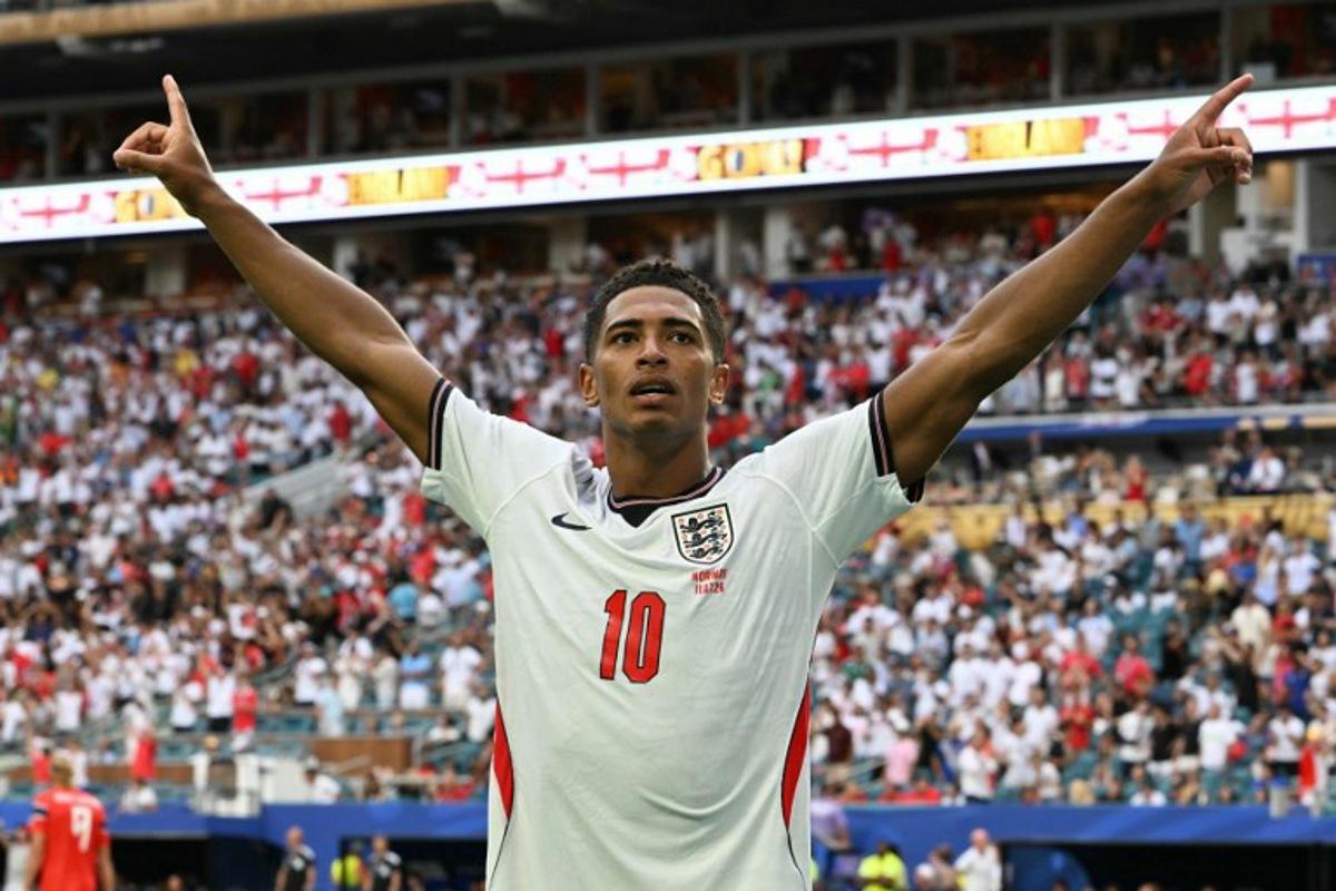 England's midfielder #10 Jude Bellingham celebrates after scoring his team's second goal during the 2026 World Cup football tournament quarter-final match between Norway and England at Miami Stadium in Miami on July 11, 2026. ROBERTO SCHMIDT / AFP