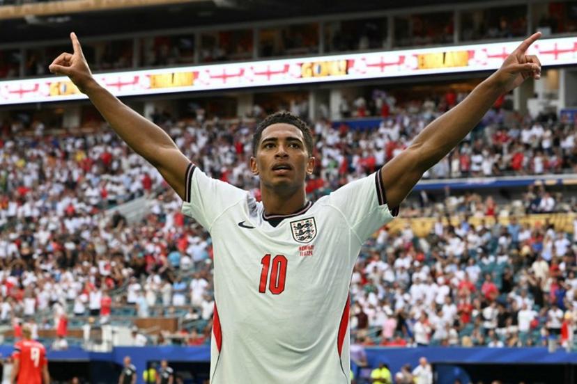 England's midfielder #10 Jude Bellingham celebrates after scoring his team's second goal during the 2026 World Cup football tournament quarter-final match between Norway and England at Miami Stadium in Miami on July 11, 2026. ROBERTO SCHMIDT / AFP