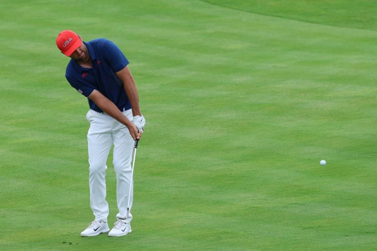 US' Scottie Scheffler competes in round 3 of the men's golf individual stroke play of the Paris 2024 Olympic Games at Le Golf National in Guyancourt, south-west of Paris on August 3, 2024. Emmanuel DUNAND / AFP