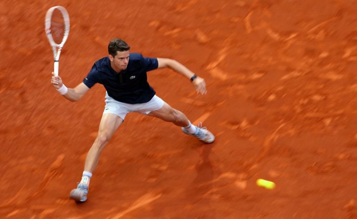 Belgium's Alexander Blockx returns the ball to Germany's Alexander Zverev during their 2026 ATP Tour Madrid Open tennis tournament semi-final singles match at the Caja Magica in Madrid, on May 1, 2026. Thomas COEX / AFP