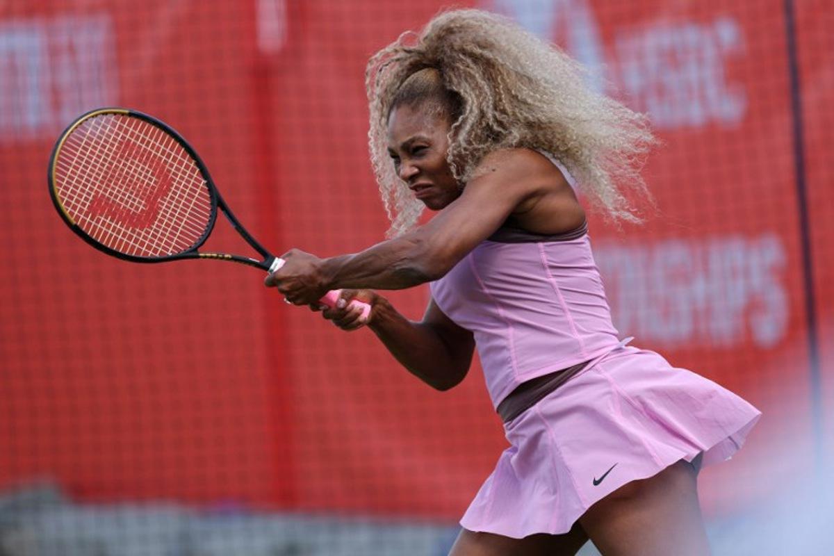 US player Serena Williams hits a shot during a practice session before her doubles match at the HSBC WTA tennis Championships at Queen's Club in west London on June 9, 2026. Adrian Dennis / AFP