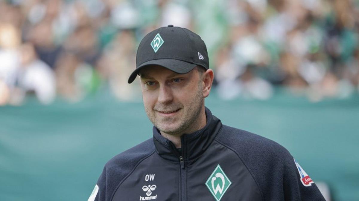 Bremen's German head coach Ole Werner head coach Zsolt Loew is seen prior to the start of the German first division Bundesliga football match between SV Werder Bremen and RB Leipzig in Bremen, northern Germany on May 10, 2025. Focke Strangmann / AFP