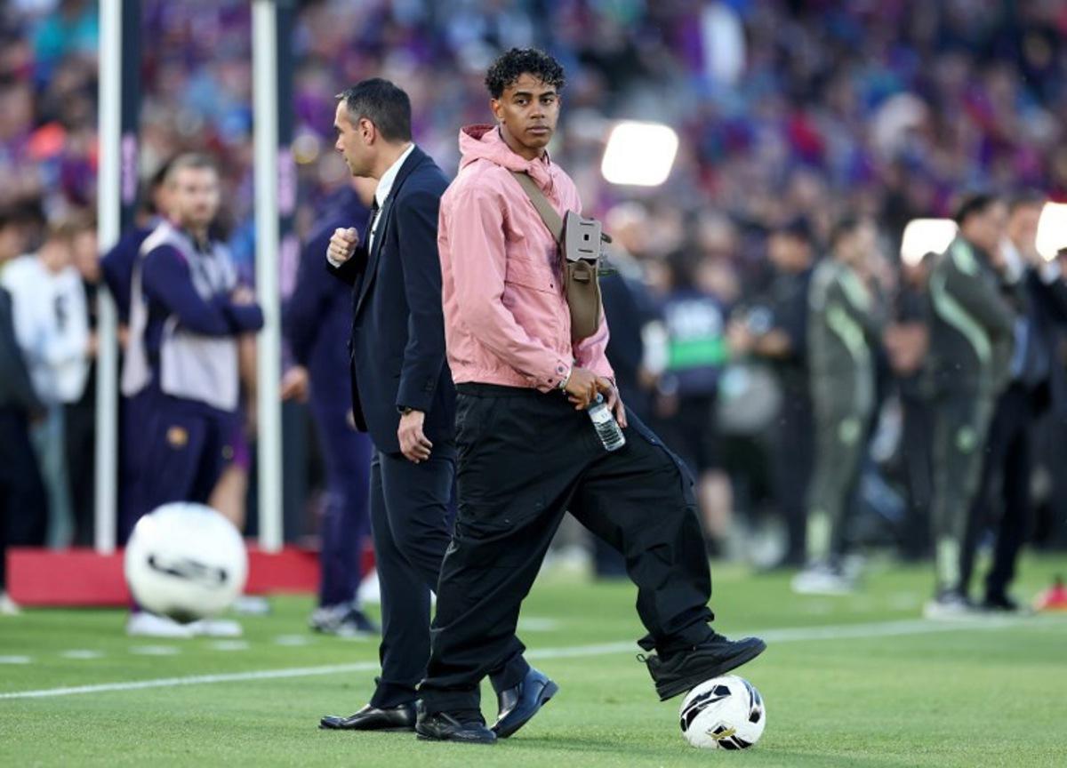 Barcelona's Spanish forward #10 Lamine Yamal stands on the side of the pitch prior the Spanish league football match between FC Barcelona and Real Madrid CF at Camp Nou Stadium in Barcelona on May 10, 2026. Josep LAGO / AFP