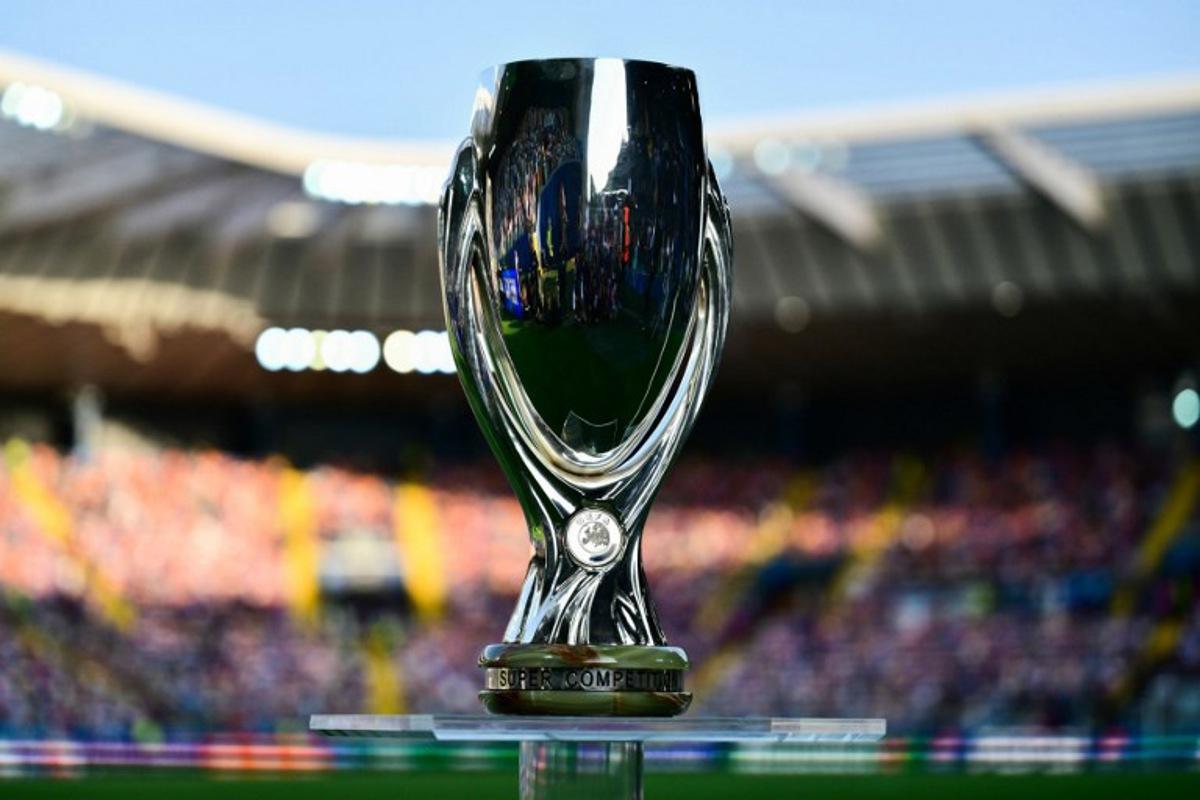 The UEFA Super Cup trophy is displayed prior to the 2025 UEFA Super Cup final football match between Paris Saint-Germain (FRA) and Tottenham Hotspur FC (ENG) at the Friuli stadium, in Udine, on August 13, 2025. Marco BERTORELLO / AFP