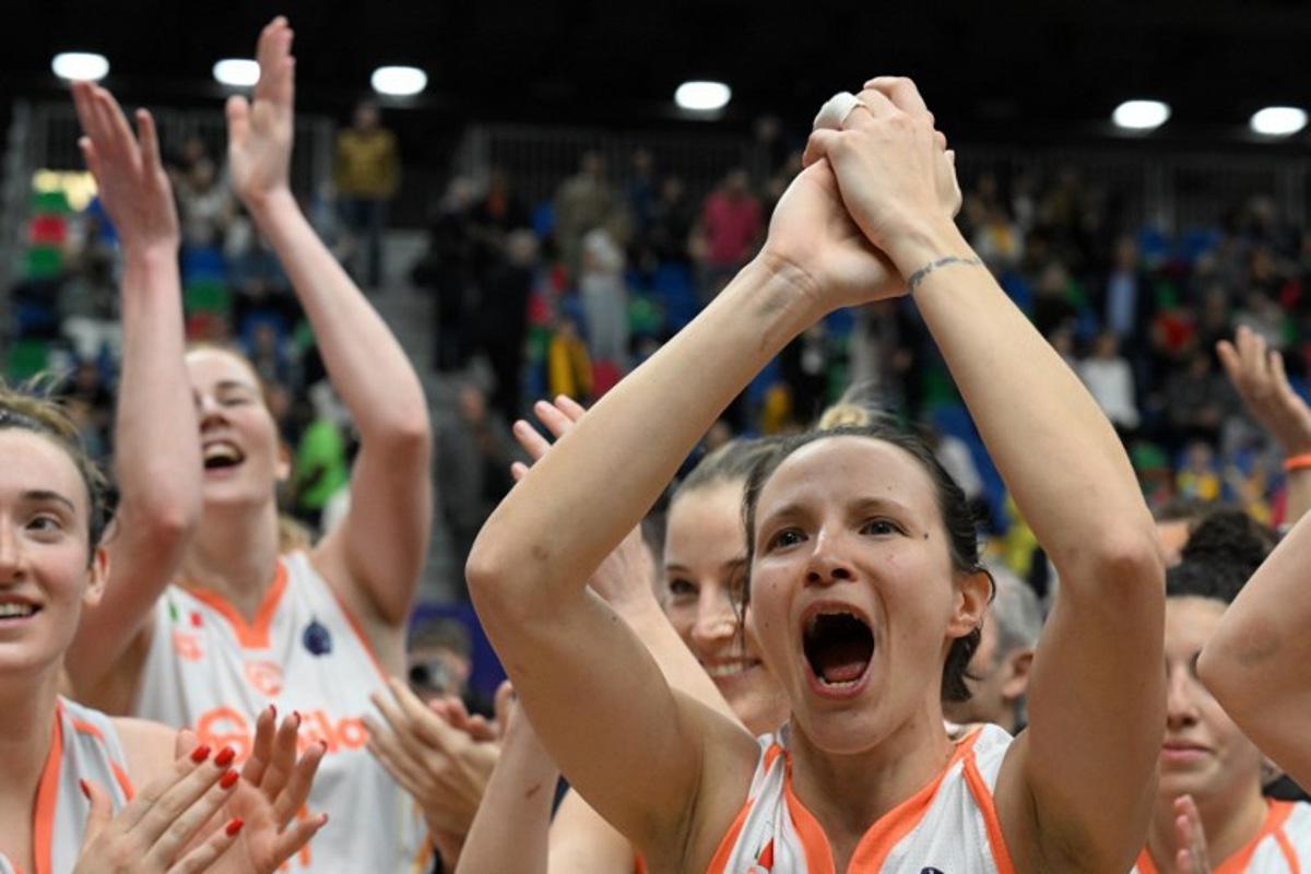 Players of Schio celebrate after defeating USK Prague in their third place match of the Euroleague Women's Final Four 2023 basketball match between USK Prague and Schio in Prague on April 16, 2023. Michal Cizek / AFP