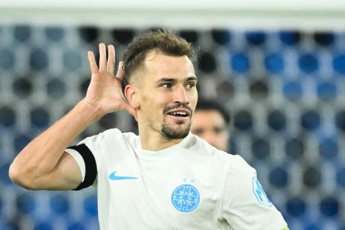Steaua Bucharest's Romanian midfielder #27 Darius Olaru celebrates after scoring his team first goal during the UEFA Europa League, league phase day 4, football match between FC Basel and FCS Bucarest at the St. Jakob-Park Stadium, in Basel, on November 6, 2025. SEBASTIEN BOZON / AFP