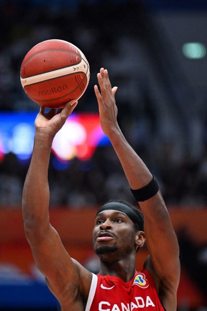 Canada's Shai Gilgeous-Alexander shoots during the FIBA Basketball World Cup match between Spain and Canada at Indonesia Arena in Jakarta on September 3, 2023. ADEK BERRY / AFP