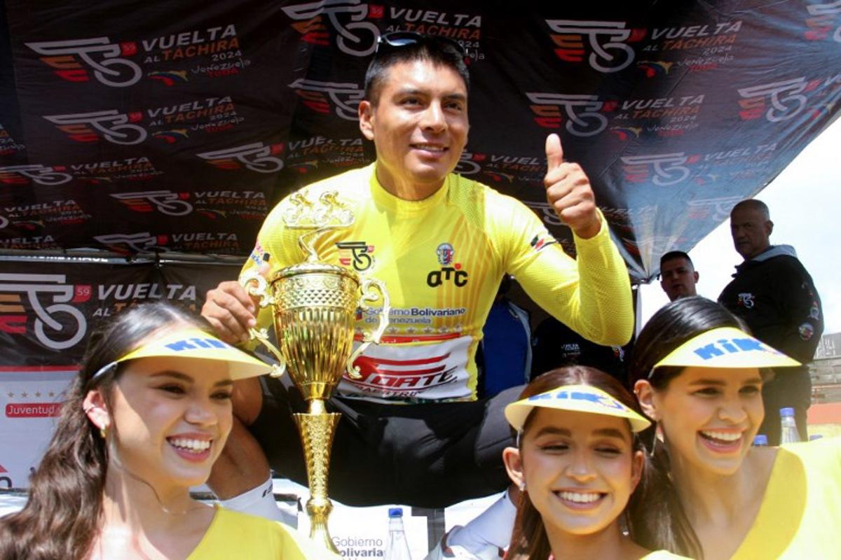 Ecuador's Jonathan Caicedo, from team Petrolike, celebrates after winning the 59th Vuelta al Tachira cycling race in San Cristobal, Tachira State, Venezuela, on January 21, 2024. Jhonny PARRA / AFP