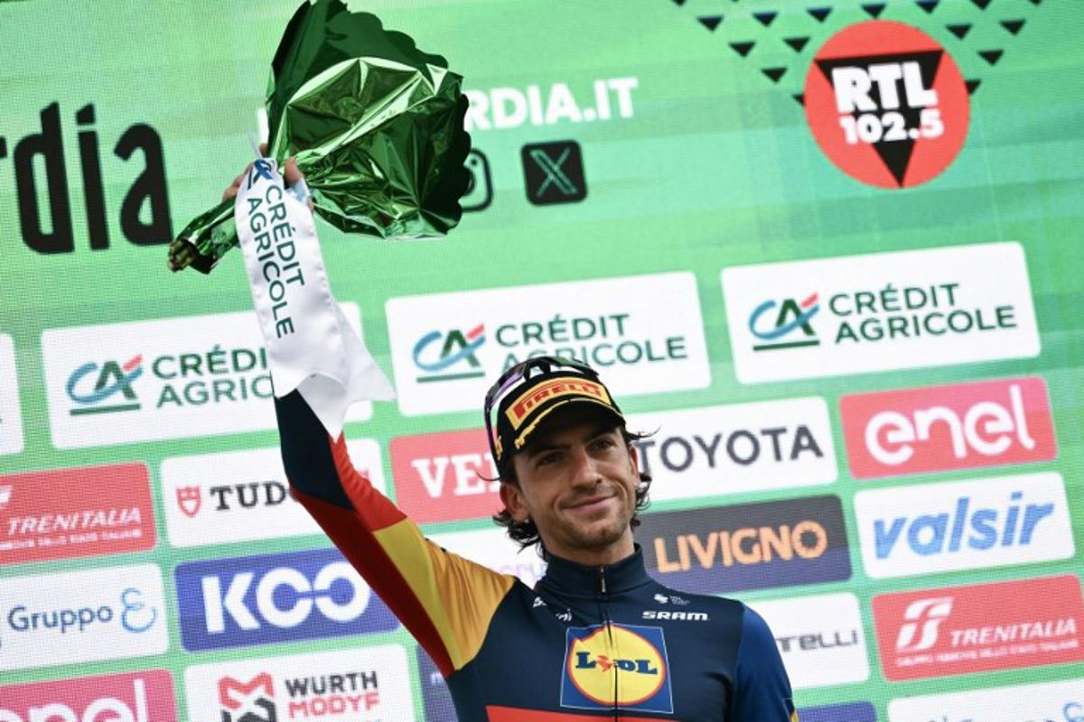 Lidl - Trek team's Italian rider Giulio Ciccone celebrates his third place on the podium after the 118th edition of the Giro di Lombardia (Tour of Lombardy), a 252km cycling race from Bergamo to Como on October 12, 2024. Marco BERTORELLO / AFP