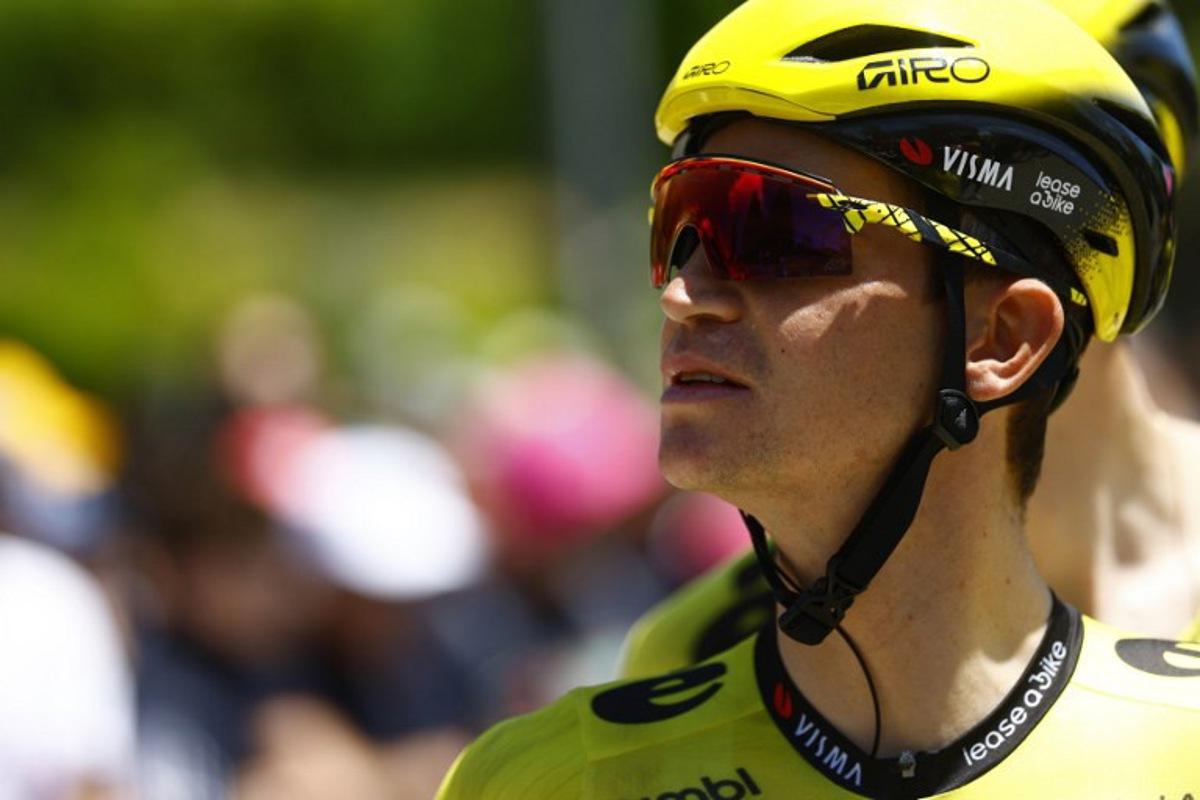Team Visma Lease a Bike US rider Sepp Kuss looks on during the presentation prior the 4th stage of the Giro d'Italia 2026 - Tour of Italy cycling race between Catanzaro and Cosenza, Italy, on May 12, 2026. Luca Bettini / AFP