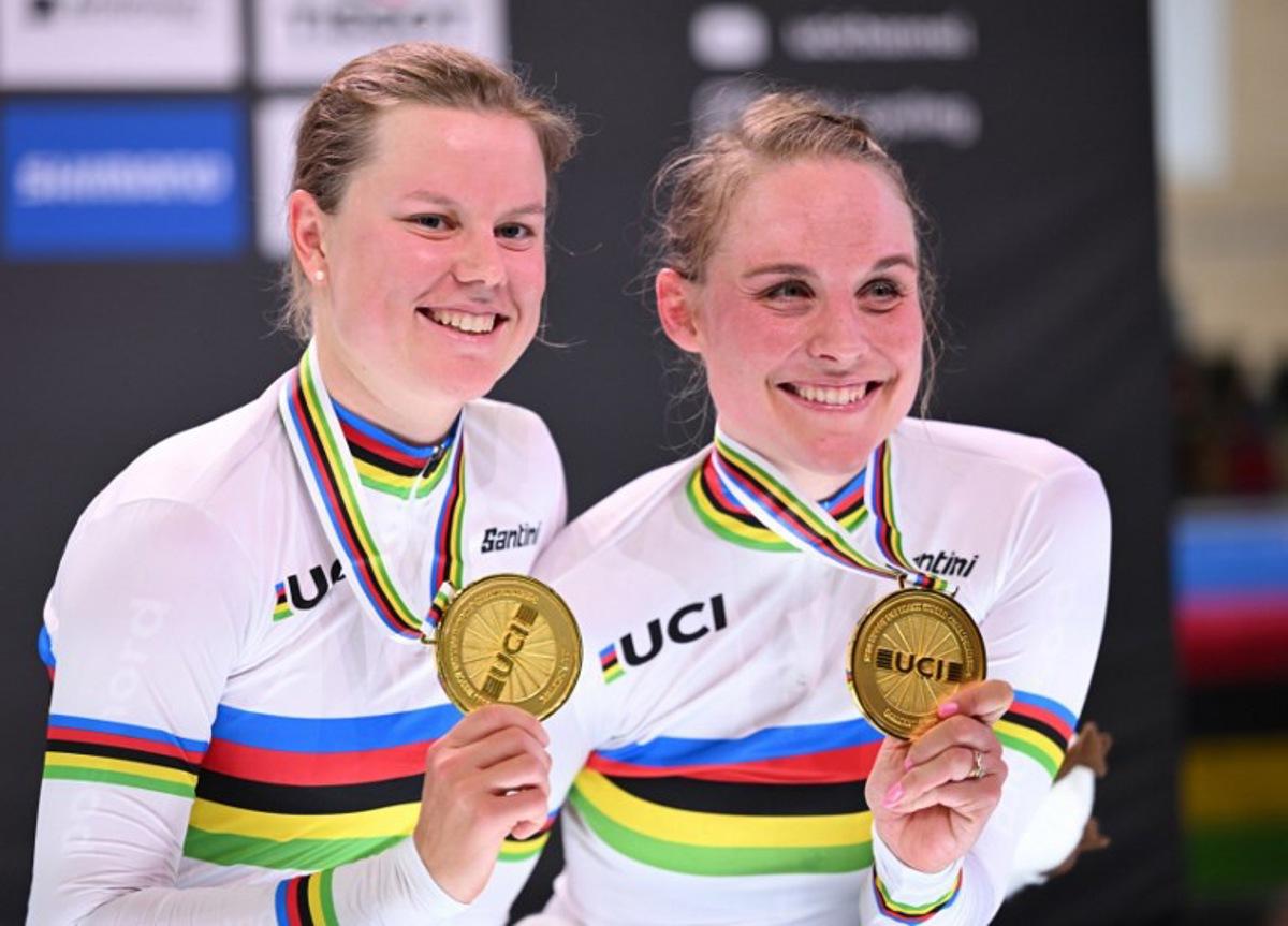 Winner Team Denmark's Amalie Dideriksen and Julie Leth celebrate during the podium ceremony after the women's Madison race of the UCI Track Cycling World Championships in Ballerup, Denmark, on October 19, 2024. Jonathan NACKSTRAND / AFP