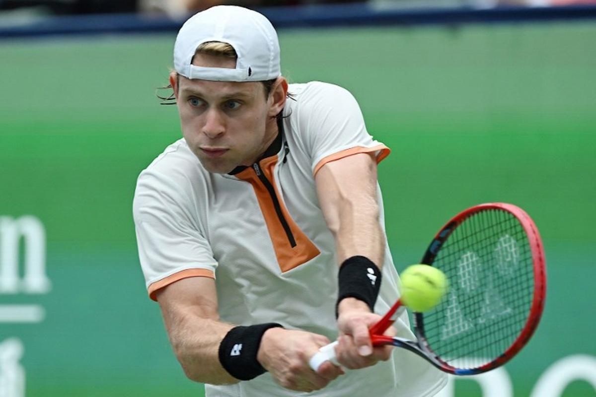 Belgium's Zizou Bergs hits a return to Canada's Gabriel Diallo during their men's singles match at the Shanghai Masters tennis tournament in Shanghai on October 7, 2025. Jade Gao / AFP