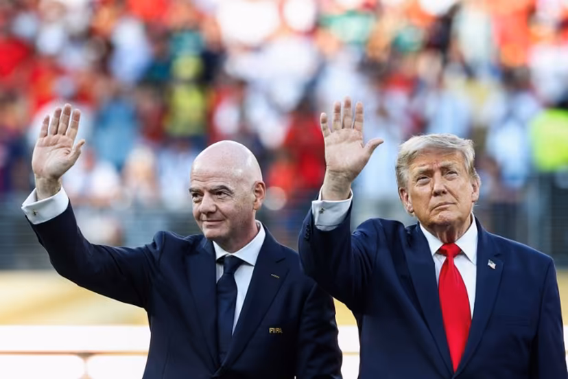 US President Donald Trump (R) and FIFA President Gianni Infantino (L) wave during the award ceremony of the 2026 World Cup football tournament final match between Spain and Argentina at the New York/New Jersey Stadium in East Rutherford on July 19, 2026. FRANCK FIFE / AFP