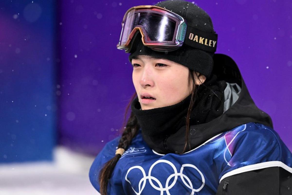 South Korea's Choi Gaon reacts in the snowboard women's halfpipe final run 3 during the Milano Cortina 2026 Winter Olympic Games at Livigno Snow Park, in Livigno (Valtellina), on February 12, 2026. Kirill KUDRYAVTSEV / AFP