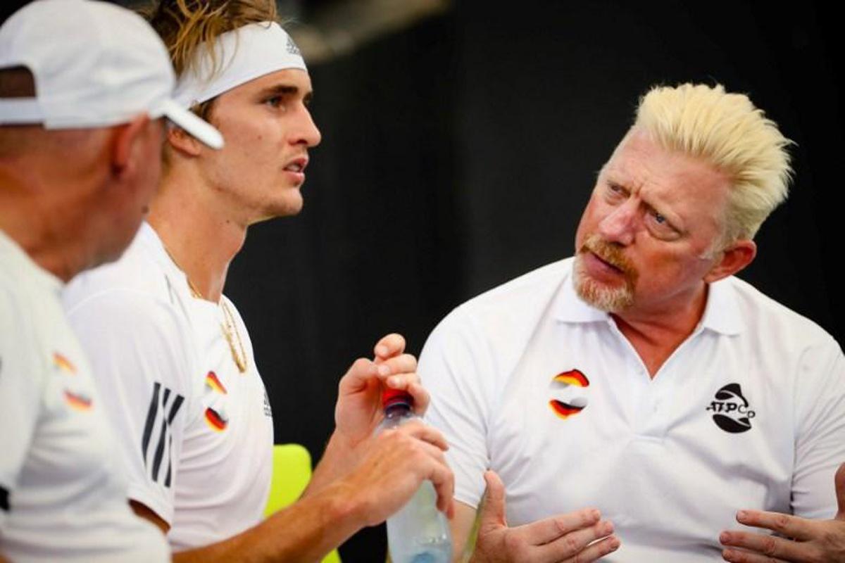 Alexander Zverev of Germany (2nd L) speaks with team captain Boris Becker (R) during the men's singles match on day five against Denis Shapovalov of Canada at the ATP Cup tennis tournament in Brisbane on January 7, 2020. Patrick HAMILTON / AFP -- IMAGE RESTRICTED TO EDITORIAL USE - STRICTLY NO COMMERCIAL USE --