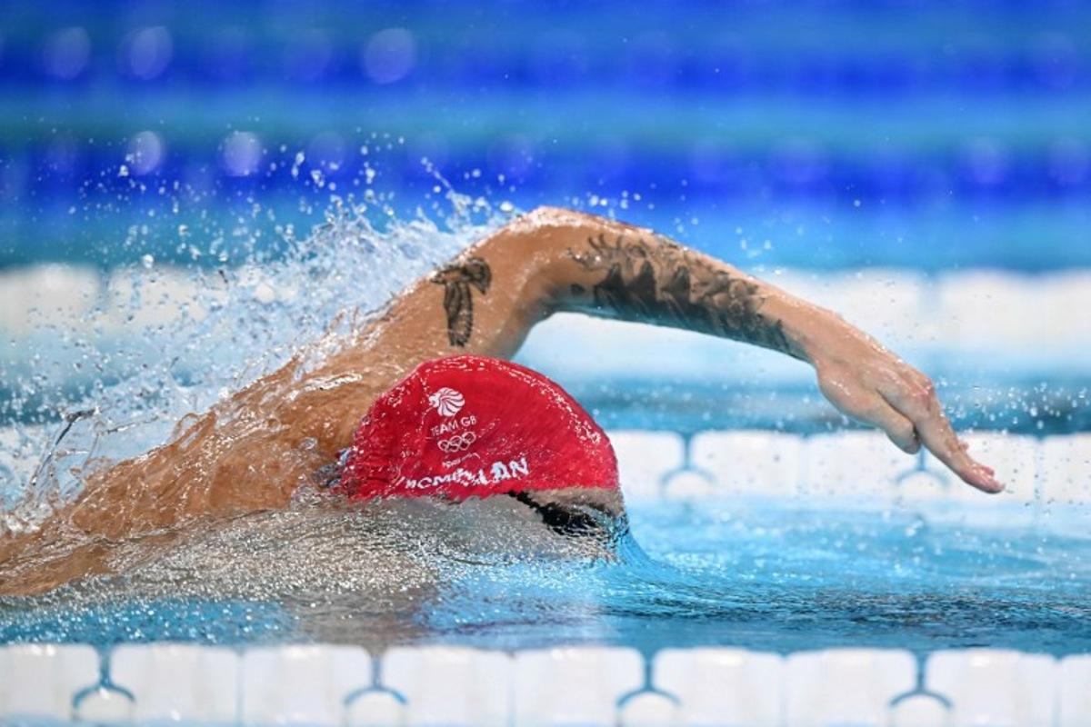 Britain's Jack Mcmillan competes in a heat of the men's 4x200m freestyle relay swimming event during the Paris 2024 Olympic Games at the Paris La Defense Arena in Nanterre, west of Paris, on July 30, 2024. SEBASTIEN BOZON / AFP