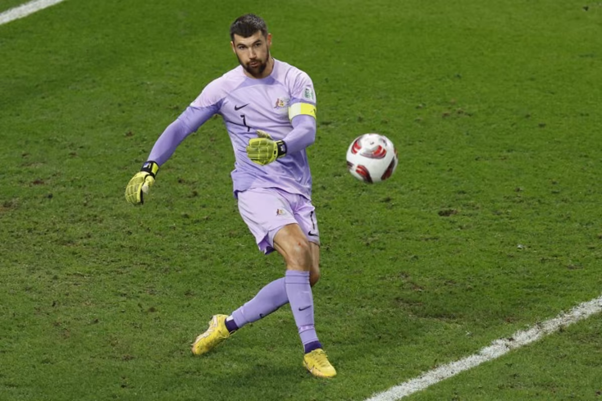 Australia's goalkeeper #01 Mathew Ryan crosses the ball during the Qatar 2023 AFC Asian Cup quarter-final football match between Australia and South Korea at Al-Janoub Stadium in al-Wakrah, south of Doha, on February 2, 2024. KARIM JAAFAR / AFP